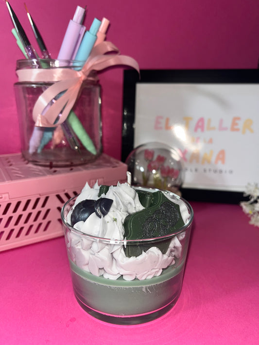 Vela temática con el lema donde nace la ambición parte posterior